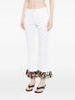 Pre-owned PUCCI fringed straight leg jeans showing distressed denim and fringe details on the hem.