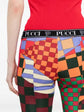 Pre-owned PUCCI pleated printed jersey flared trousers with a stylish, flowing design and vibrant pattern.