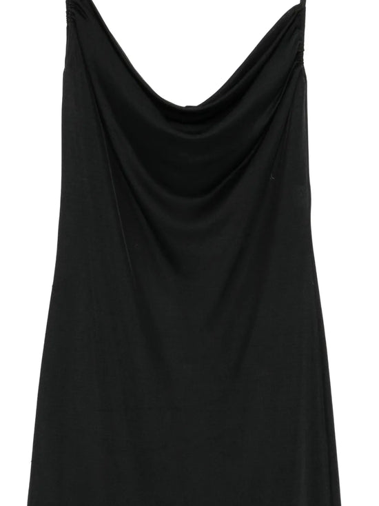 Close-up of a black Emilio Pucci slip dress showcasing smooth fabric and elegant design details.
