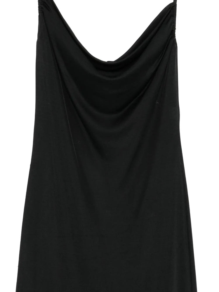 Close-up of a black Emilio Pucci slip dress showcasing smooth fabric and elegant design details.