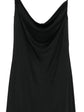 Close-up of a black Emilio Pucci slip dress showcasing smooth fabric and elegant design details.