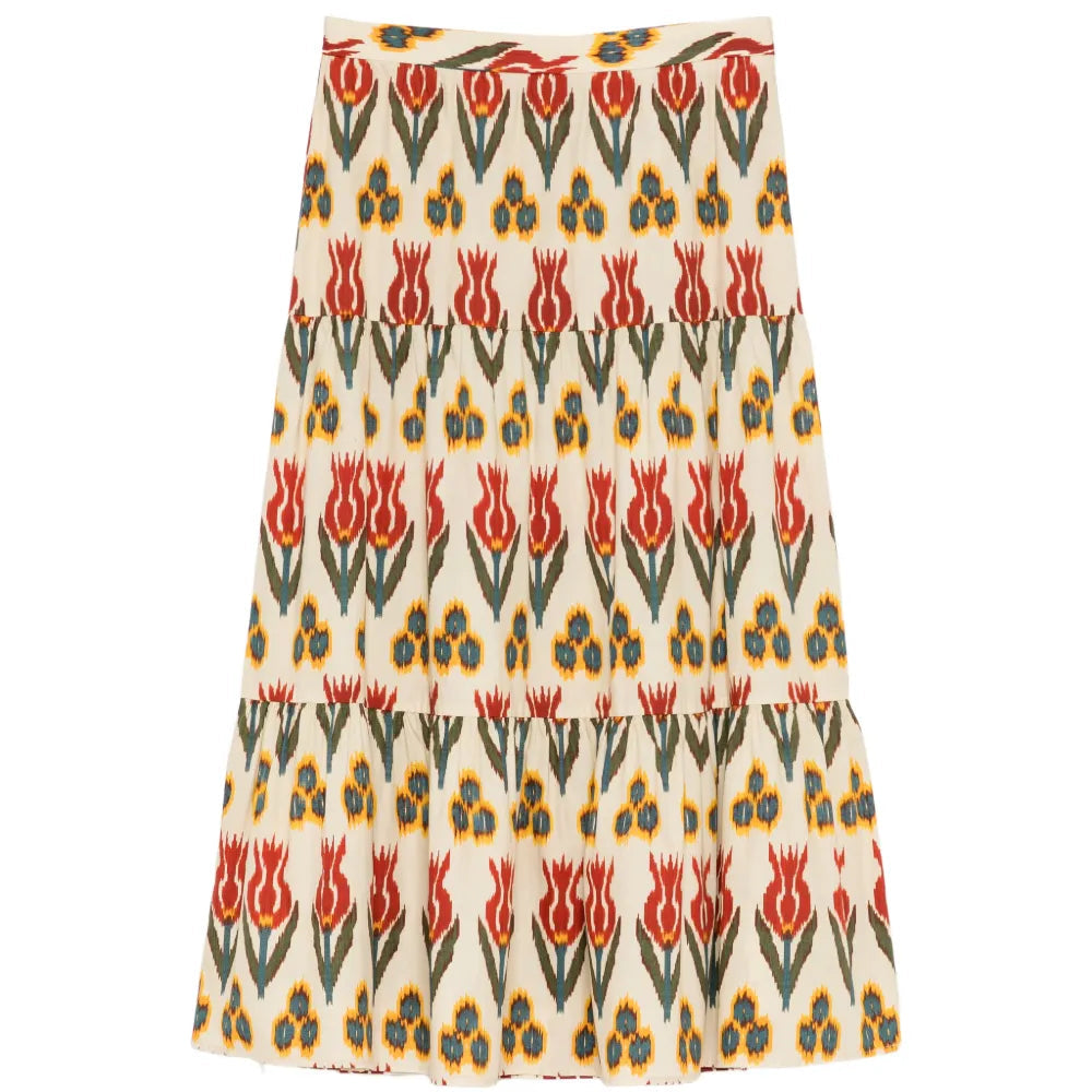 Red Valentino tiered printed skirt with ruffle layers, showcasing vibrant floral patterns and flowing fabric.