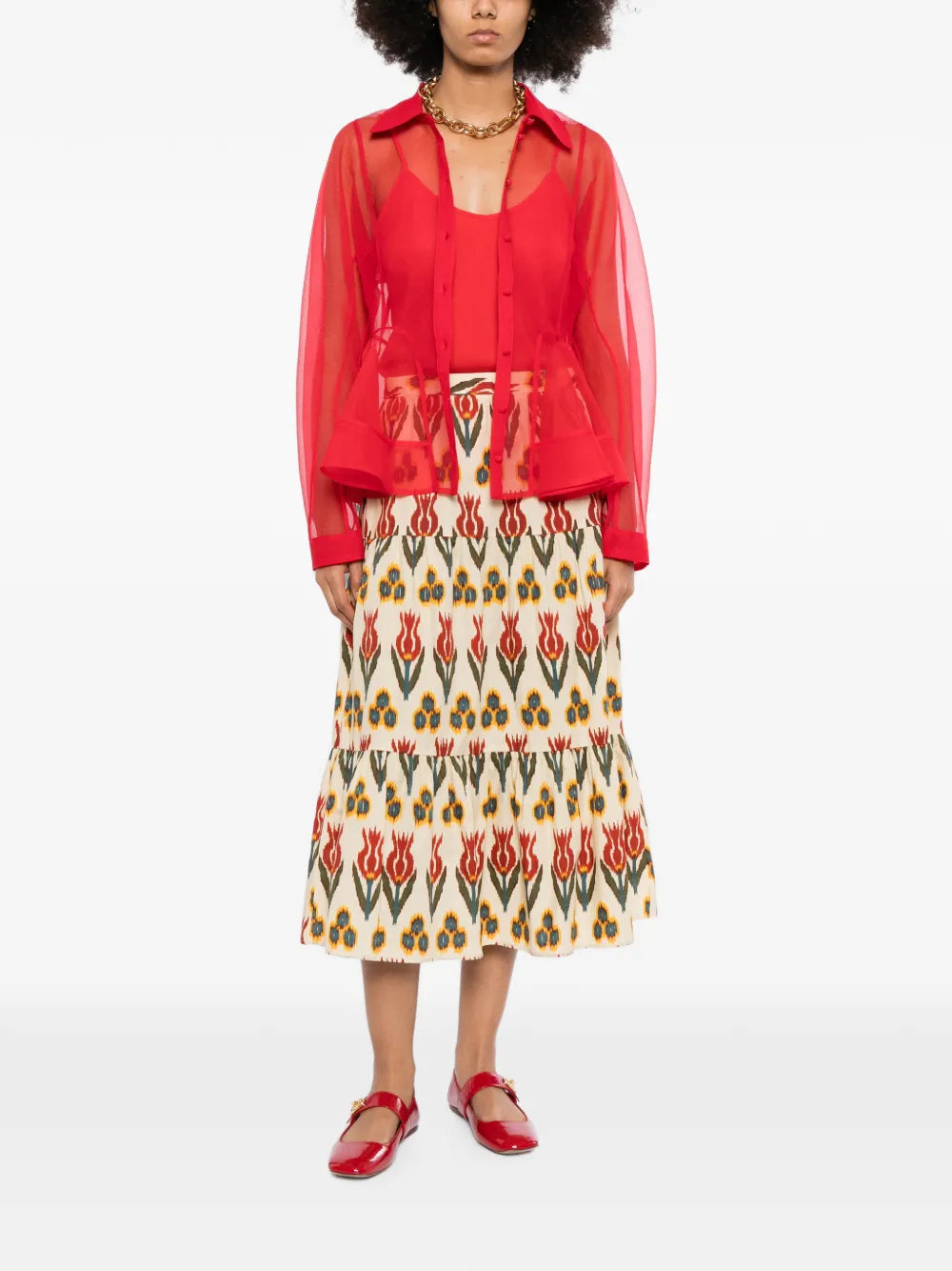 Red Valentino tiered printed skirt featuring a flowing design with layered fabric and vibrant pattern details.