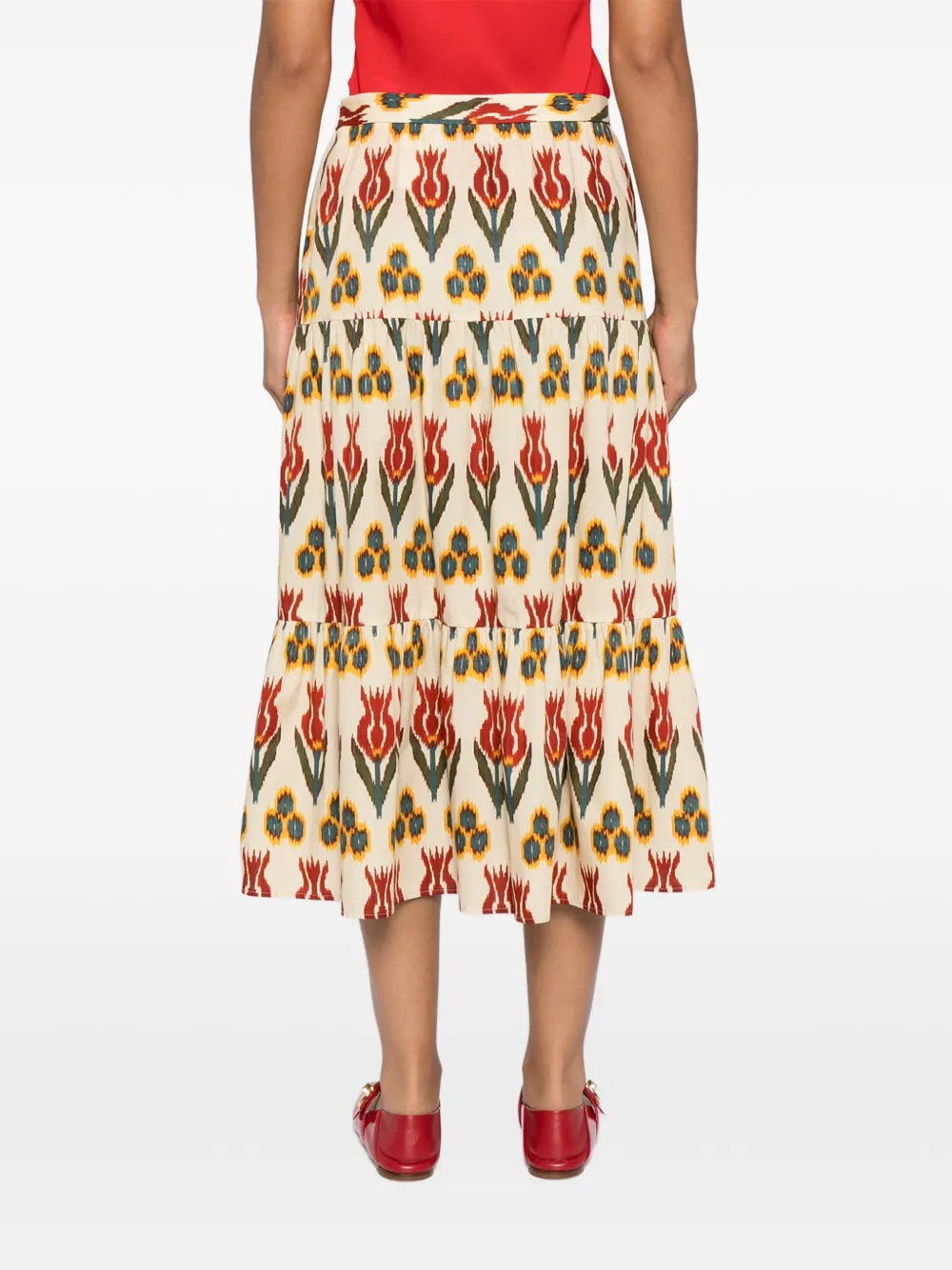 Red Valentino tiered printed skirt with ruffled layers, featuring vibrant floral pattern and lightweight fabric for a stylish look.