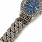 Rolex x Loree Rodkin luxury watch with a sleek design, featuring a silver dial and elegant band.