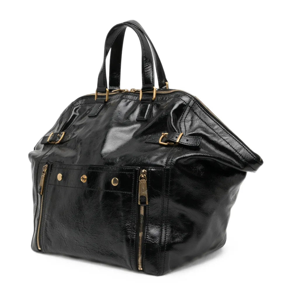 Black Saint Laurent Downtown patent leather tote bag with structured design and top handles, stylish and versatile for everyday use.