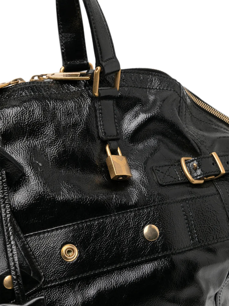Black Saint Laurent Downtown patent leather tote bag with sleek design and structured silhouette.