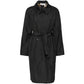 Pre-owned Saint Laurent black trench coat displayed on a hanger, showcasing classic double-breasted design and sleek fabric.
