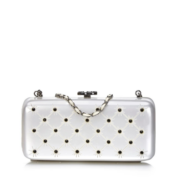 Silver crystal-encrusted Chanel clutch purse, elegant minaudiere with sparkling embellishments and a sleek design.