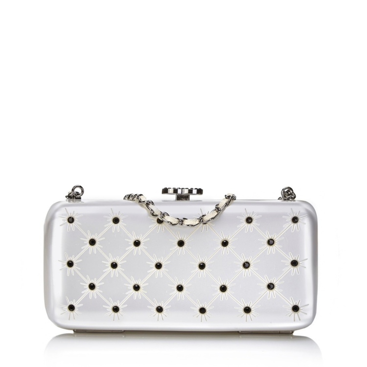 Silver crystal-encrusted Chanel clutch purse, elegant minaudiere with sparkling embellishments and sleek metallic finish.
