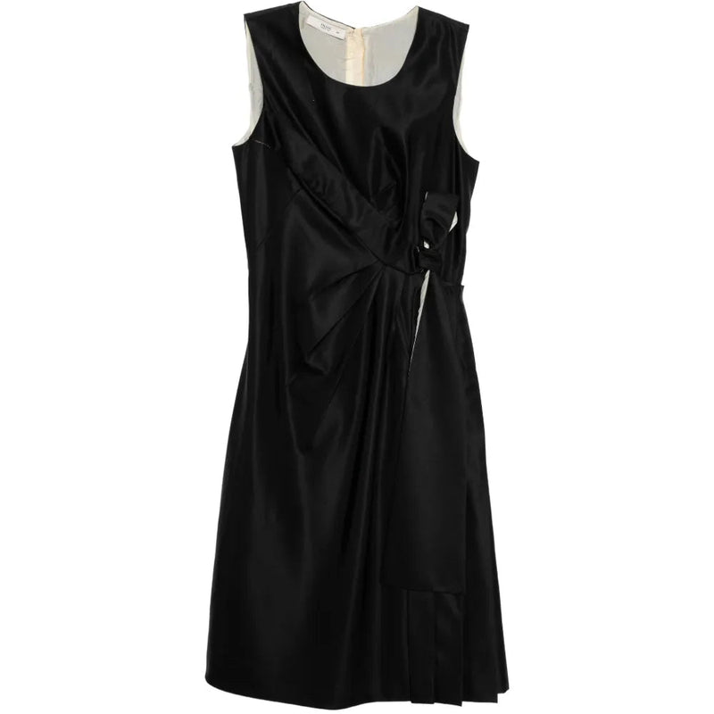 Prada sleeveless dress with a bow detail, shown from the front, featuring elegant fabric and stylish design.