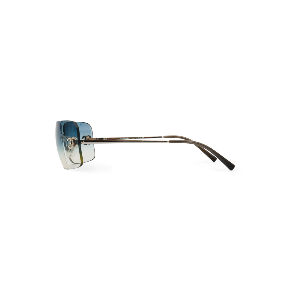 Sunglasses with a reflective lens on a white background