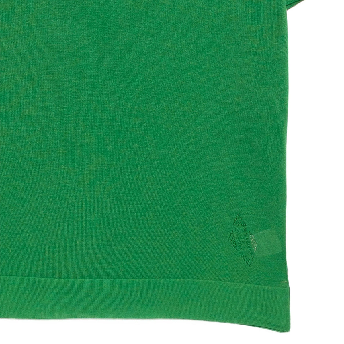 Hermès silk green top showing smooth fabric and elegant design, perfect for stylish casual or formal wear.