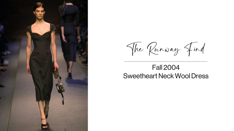 Prada 2004 black wool midi dress with sweetheart neckline, cap sleeves, contrast piping, cut-out detailing, fitted waist, exposed back zip and structured silhouette.