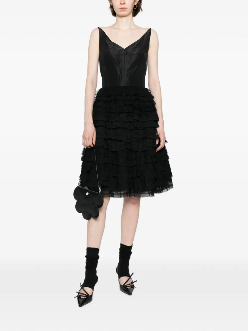 Elegant tiered tulle dress by Other Designers featuring layered fabric and a flowing silhouette, perfect for formal occasions.