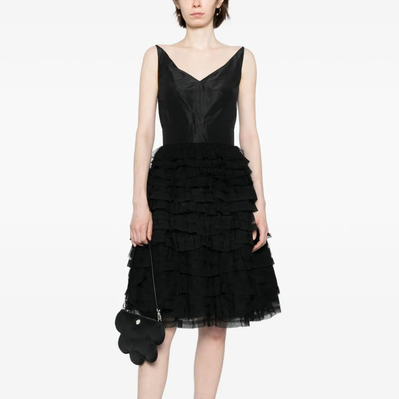 Elegant tiered tulle dress by Other Designers featuring layered fabric and a flowing silhouette, perfect for formal occasions.