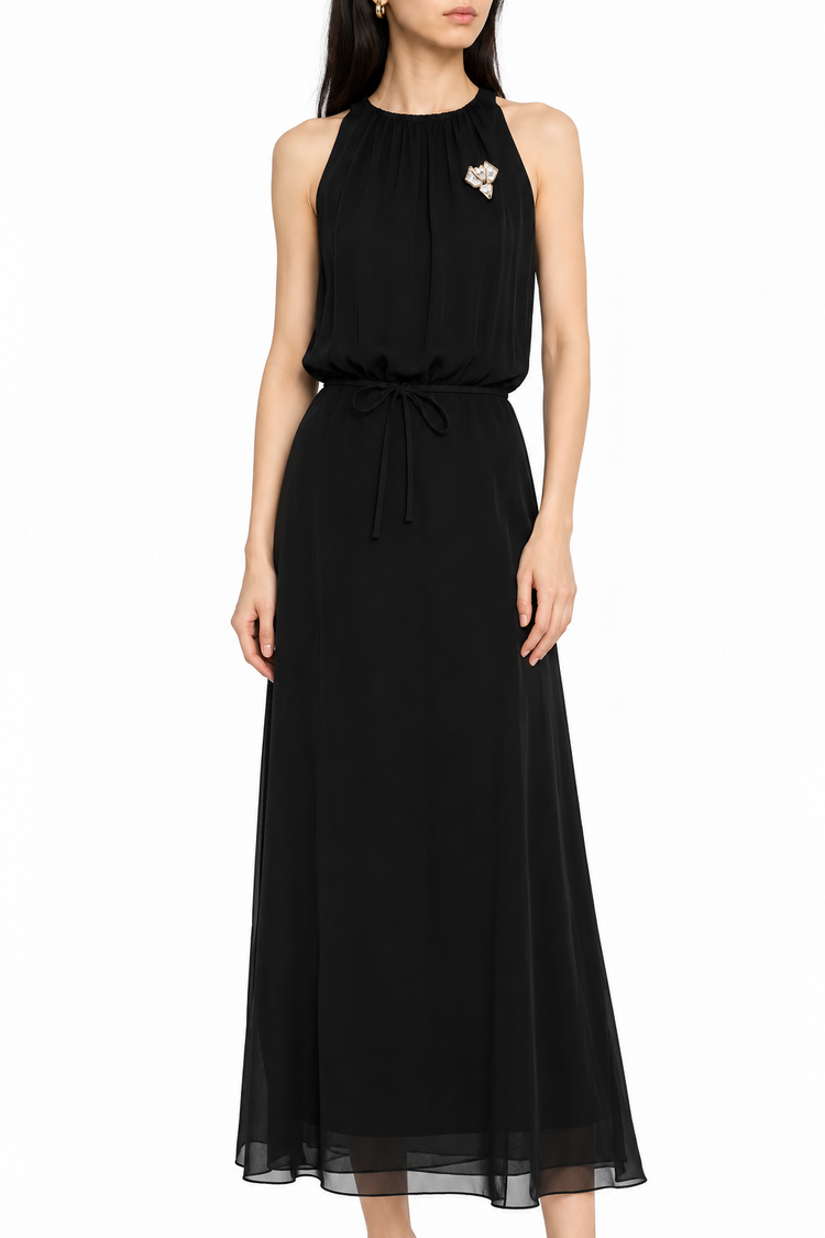 Elegant black silk gown by Valentino featuring a flowing chiffon design, perfect for formal occasions and evening wear.