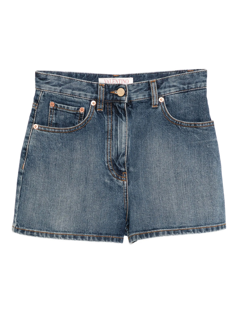 Valentino denim shorts with distressed details and rolled cuffs, stylish casual shorts for summer wear.