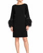 Valentino feather dress featuring delicate feather details, elegant design, and flowing fabric for a sophisticated look.