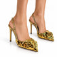 Valentino Atelier 03 Rose Edition metallic slingback pumps in gold with a pointed toe and elegant design.
