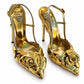 Valentino Atelier 03 Rose Edition metallic slingback pumps in gold with pointed toes and elegant design.