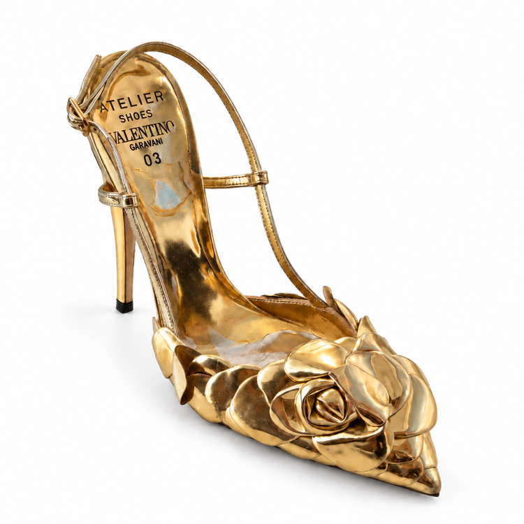 Valentino Atelier 03 Rose Edition metallic slingback pumps with pointed toes and elegant design on a white background.