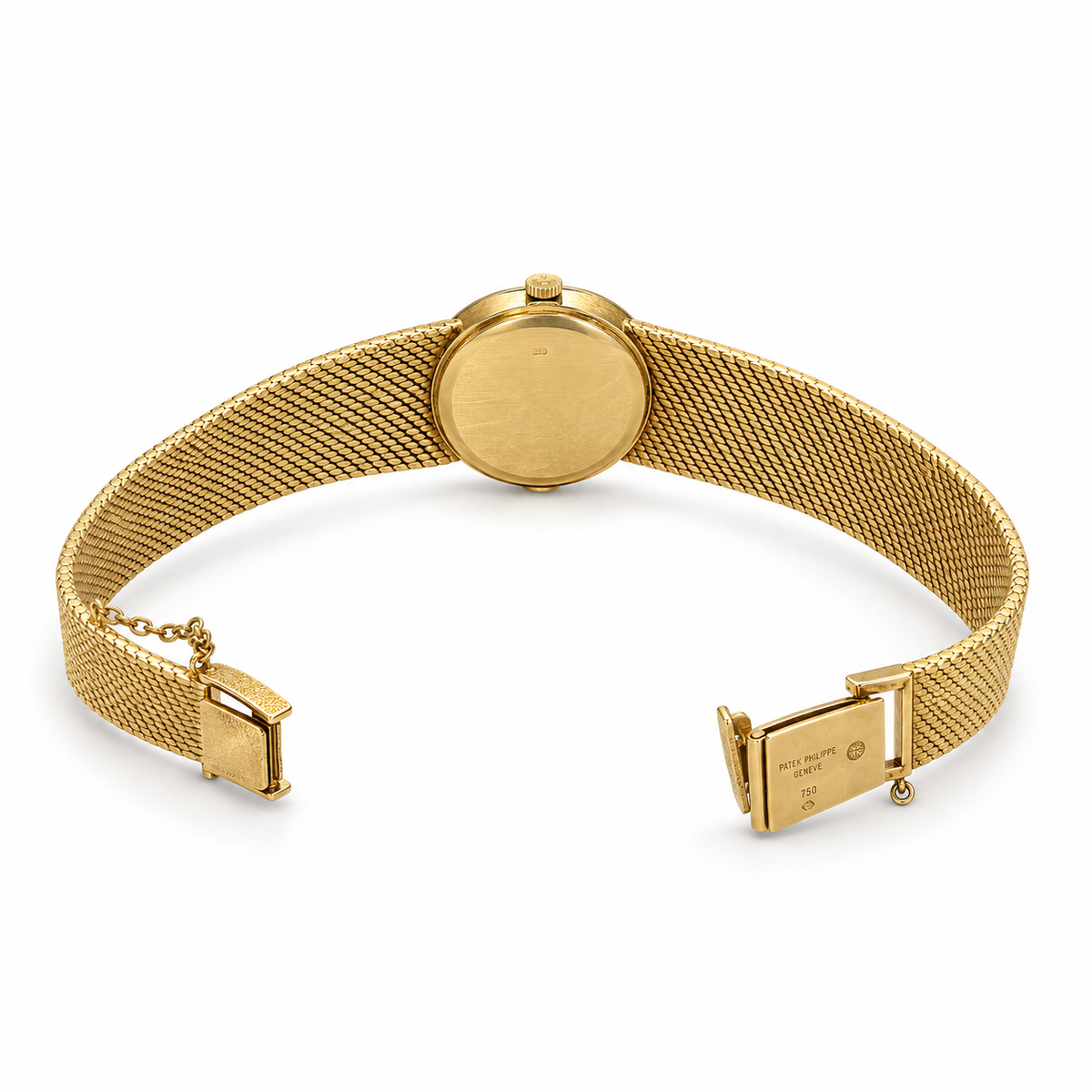 Vintage Patek Philippe Ellipse Reference 4139/1 ladies’ 18K gold manual-wind bracelet watch with textured dial, hammered bezel and integral woven gold bracelet.