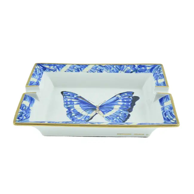 Hermès Butterfly Ashtray, a decorative ceramic object with butterfly design, featuring smooth edges and vibrant colors.