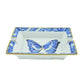 Hermès Butterfly Ashtray, a decorative ceramic object with butterfly design, featuring smooth edges and vibrant colors.