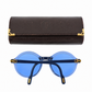 Cartier prescription sunglasses with blue frames and dark tinted lenses, stylish and protective eyewear for everyday wear.