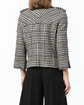 Chanel 2006 houndstooth zip-up jacket, blazer style with classic black and white pattern, shown on a mannequin.