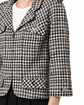 Chanel 2006 houndstooth zip-up jacket featuring a classic pattern, tailored fit, and stylish collar detail.