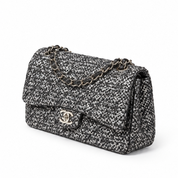 Silver tweed Chanel shoulder bag with sequins and a double flap design, featuring a stylish and elegant look.