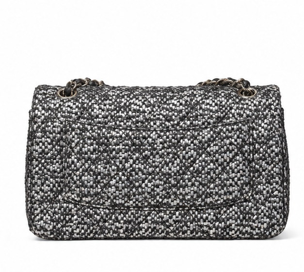 Chanel Silver Tweed Sequins Jumbo Double Flap Shoulder Bag shown from the back, featuring silver tweed fabric and sequined embellishments.