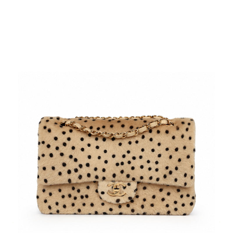 Chanel cheetah print medium flap handbag with gold hardware, featuring a stylish animal print design and elegant craftsmanship.