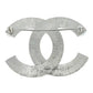 Elegant crystal Chanel pin brooch with intricate design, perfect for adding a touch of luxury to outfits.