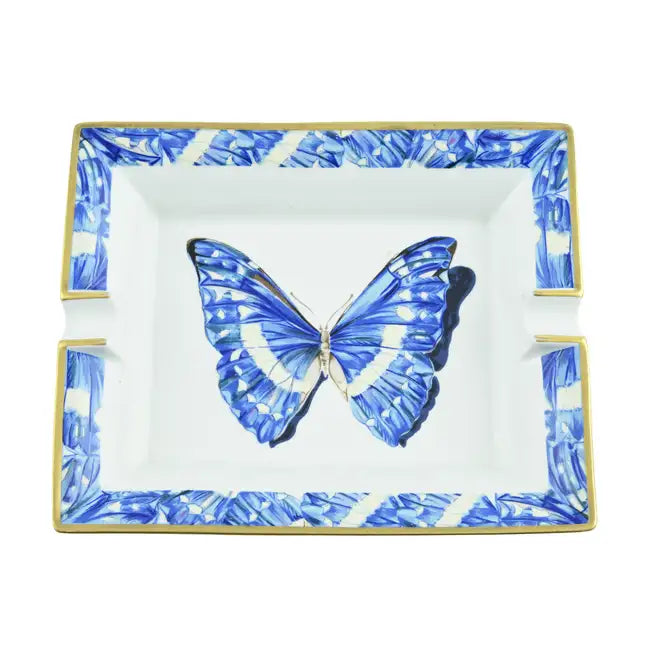 Hermès Butterfly ashtray with intricate butterfly design, crafted from elegant ceramic, showcasing fine details and a glossy finish.