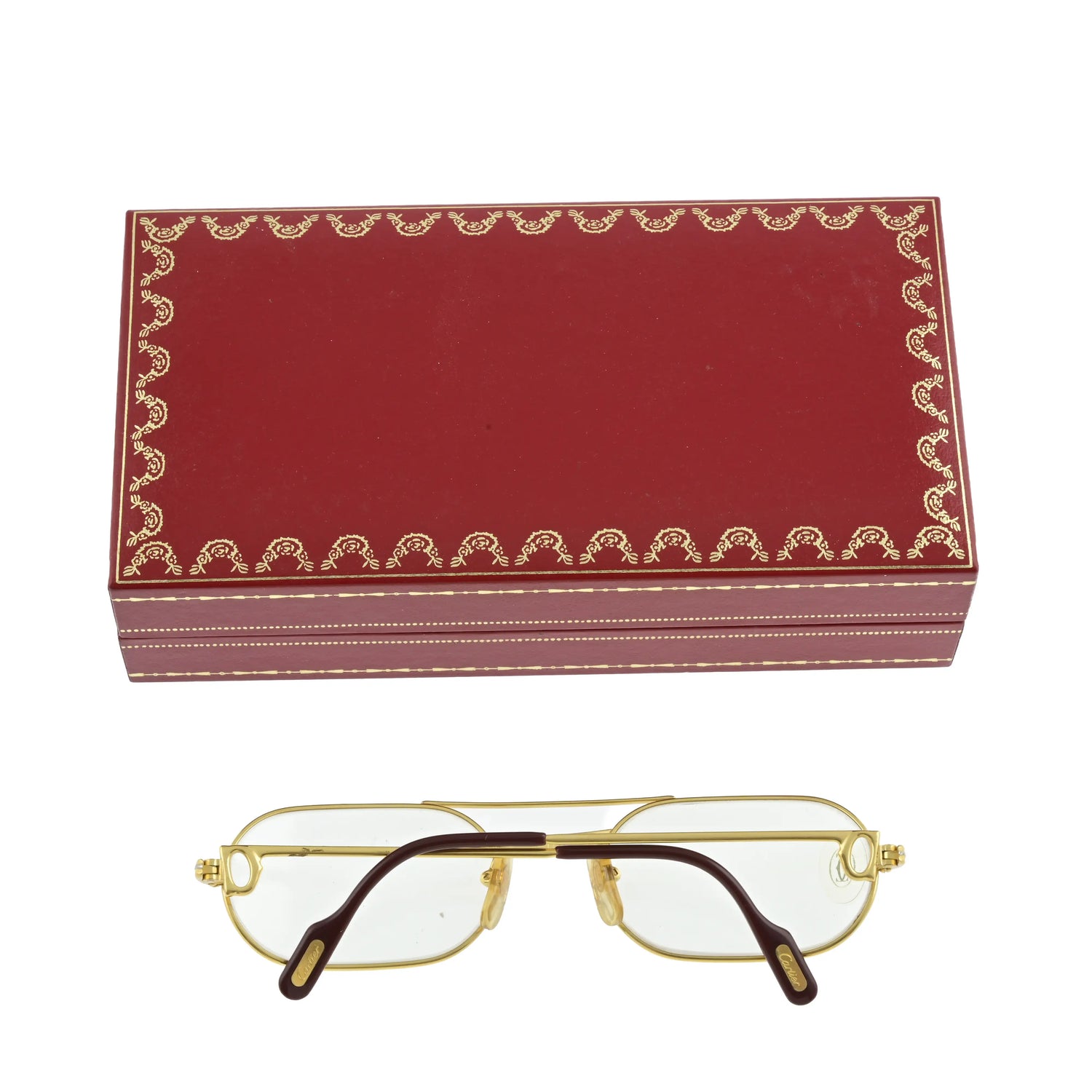 Vintage Louis Cartier sunglasses with round tinted lenses and classic metal frames, stylish eyewear for a sophisticated look.