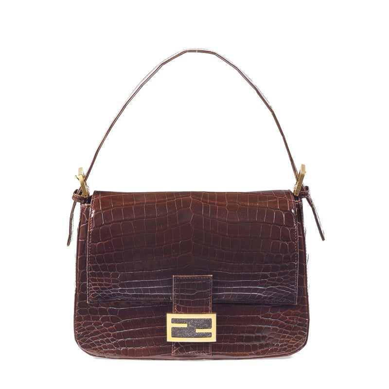Rare vintage Fendi Mama Baguette crafted in glossy brown crocodile leather with gold-tone FF hardware. An iconic early 2000s shoulder bag and highly collectible Y2K investment piece.