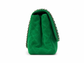 A green quilted suede shoulder bag with a silver-tone chain strap, shown from the back on a white background.
