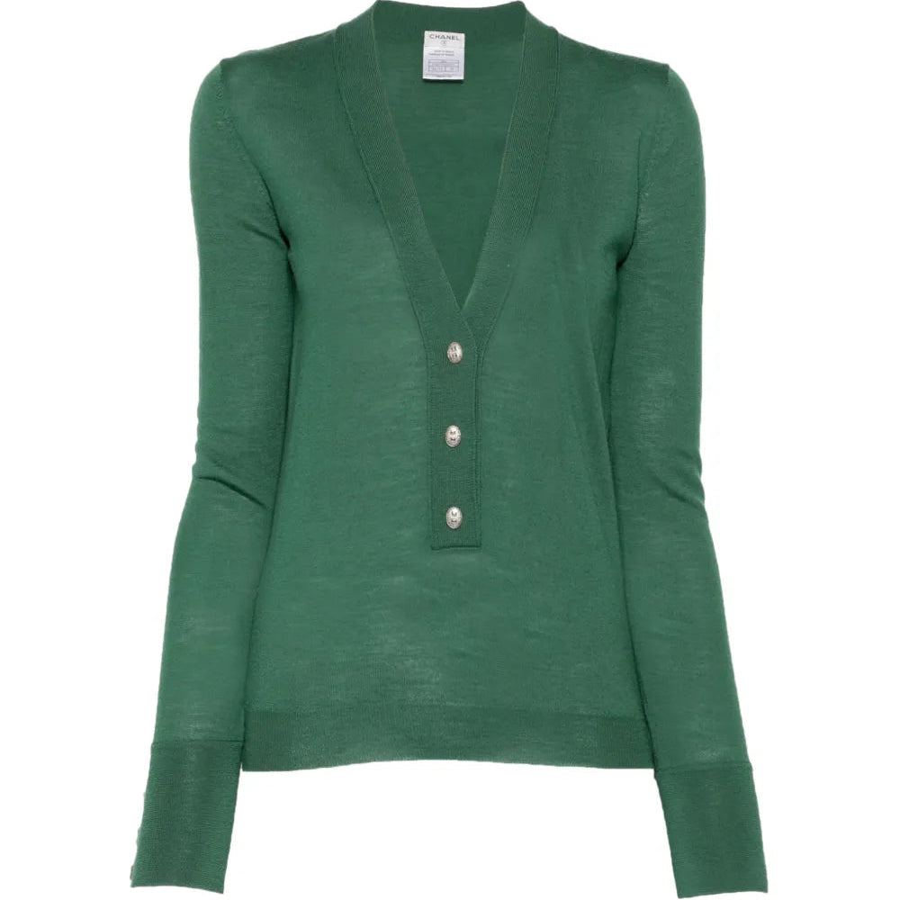 Pre-owned green wool top by CHANEL, stylish and cozy with a classic fit, perfect for elegant casual wear.