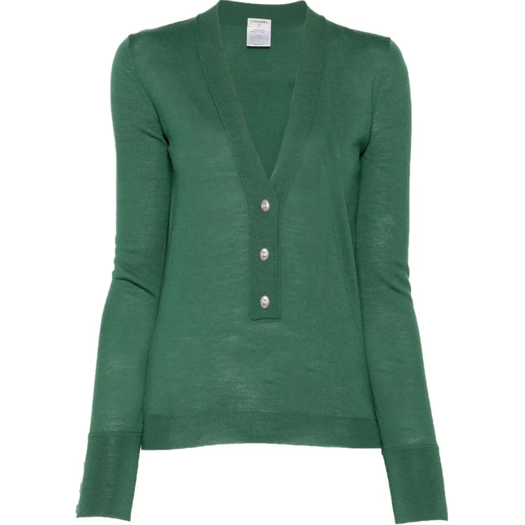 Pre-owned green wool top by CHANEL, stylish and cozy with a classic fit, perfect for elegant casual wear.