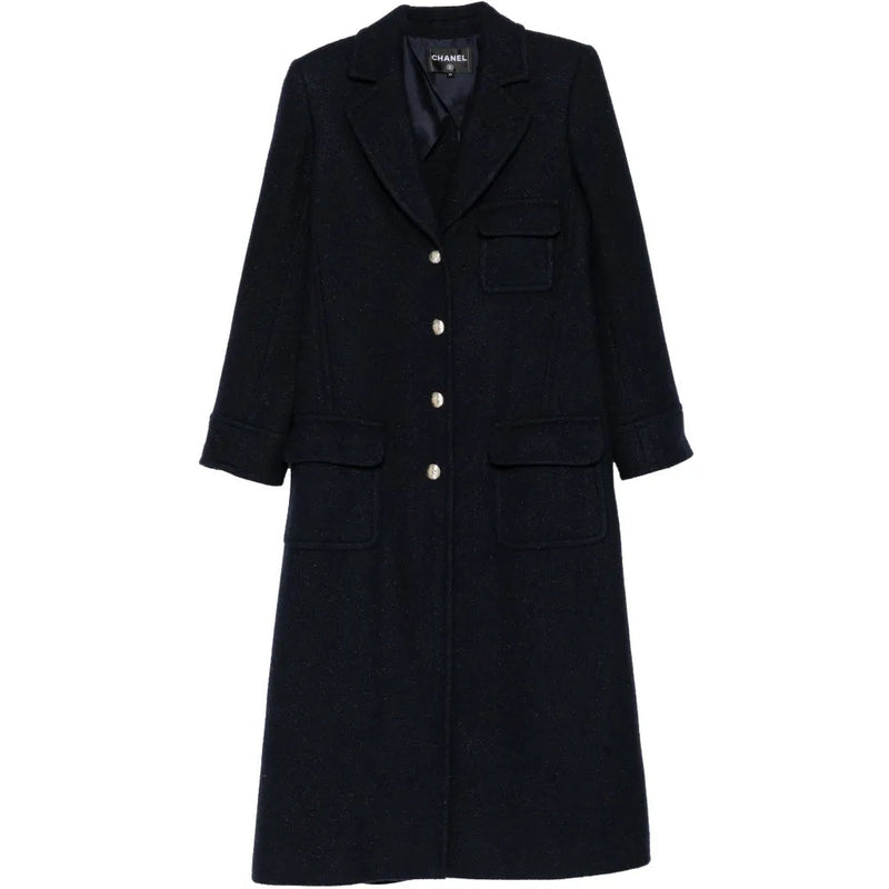 Navy wool coat by CHANEL, stylish and warm, featuring classic design and tailored fit, perfect for cold weather wear.