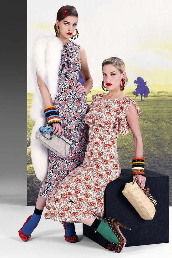 Prada floral ruffled midi dress with a fitted bodice and flowing skirt, perfect for resort and summer occasions.