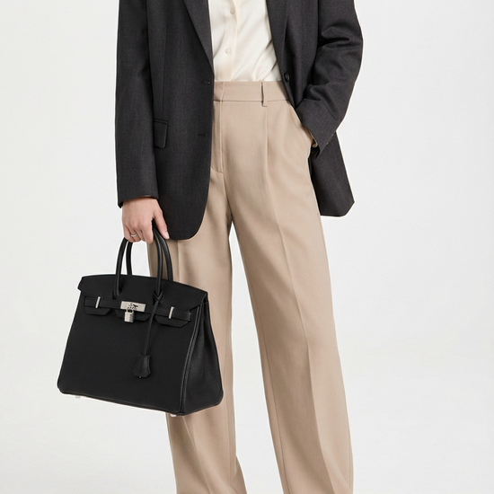 Hermès Birkin 25 Etain Epsom top handle bag with diamond accents, showcasing luxurious craftsmanship and elegant design.
