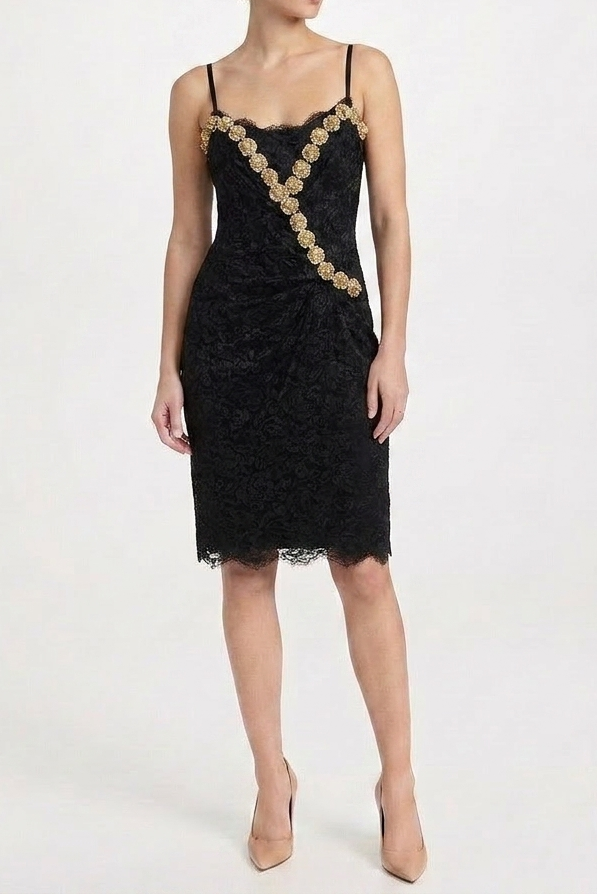 Elegant Dolce & Gabbana lace slip dress with delicate floral details and a sleek, fitted silhouette.