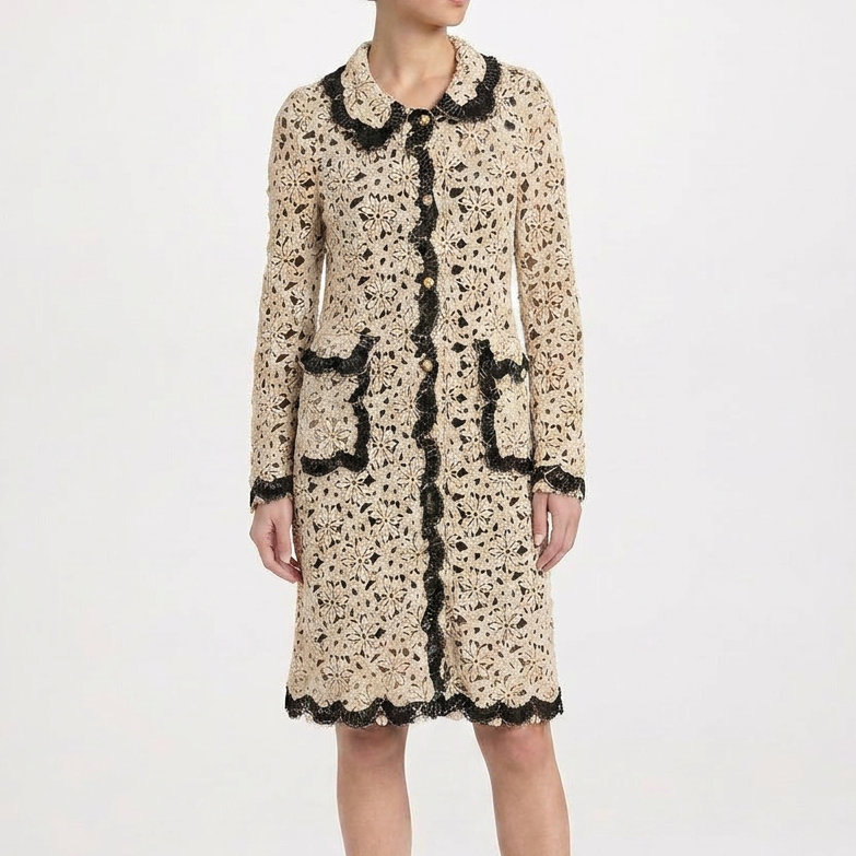 Dolce & Gabbana floral crochet lace coat with intricate lace pattern and elegant design, shown on a model.