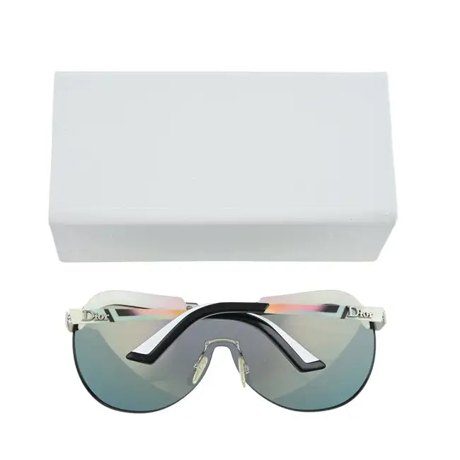 Vintage Dior Solar Shield sunglasses with dark tinted lenses and sleek black frame, displayed with their box.