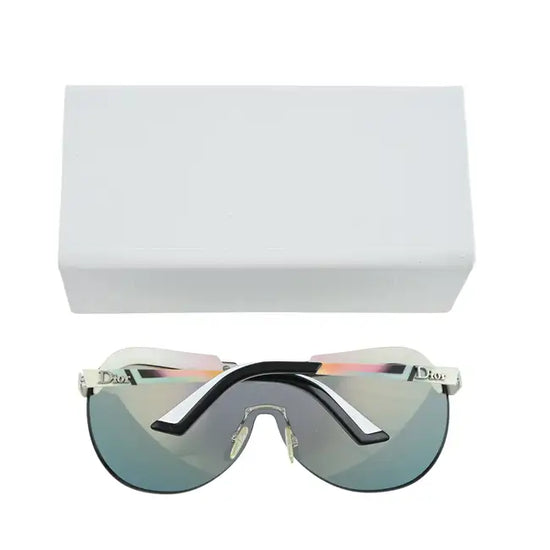 Vintage Dior Solar Shield sunglasses with dark tinted lenses and sleek black frame, displayed with their box.