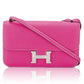 Hermès Tyrien pink Epsom leather Constance Elan shoulder bag with gold hardware, showcasing the elegant design and craftsmanship.